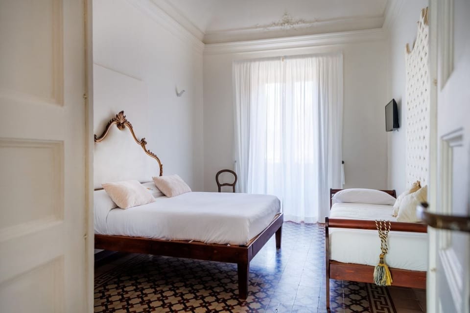 Triple Room, Private Bathroom | 1 bedroom, blackout drapes, free WiFi, bed sheets