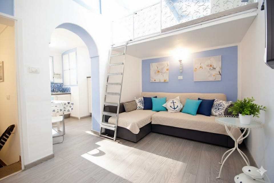 Apartment, 1 Bedroom, Terrace | Living area | Flat-screen TV