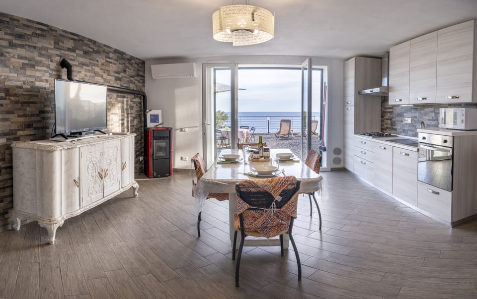 Apartment, 1 Bedroom, Sea View | Private kitchen | Full-size fridge, microwave, oven, stovetop