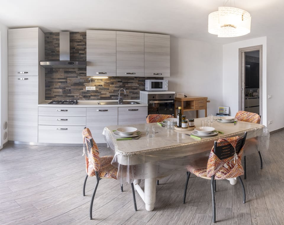 Apartment, 1 Bedroom, Sea View | Private kitchen | Full-size fridge, microwave, oven, stovetop