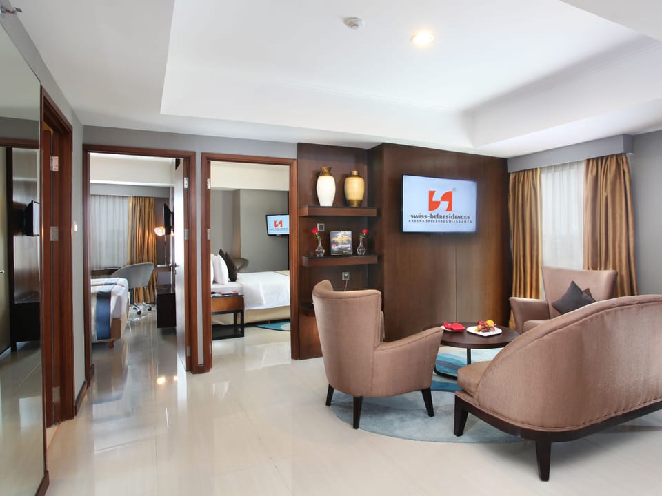 Family Room, 2 Bedrooms | Minibar, in-room safe, desk, blackout drapes