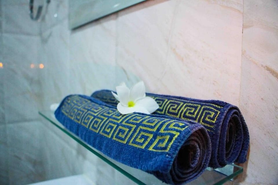 Shower, free toiletries, hair dryer, slippers