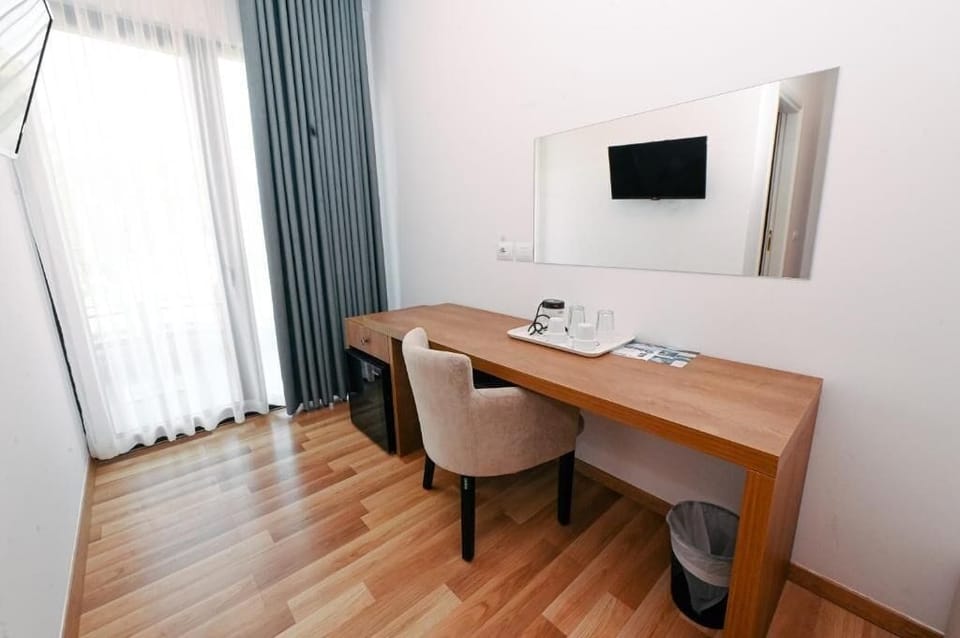 Deluxe Double Room, Balcony | Minibar, in-room safe, desk, blackout drapes