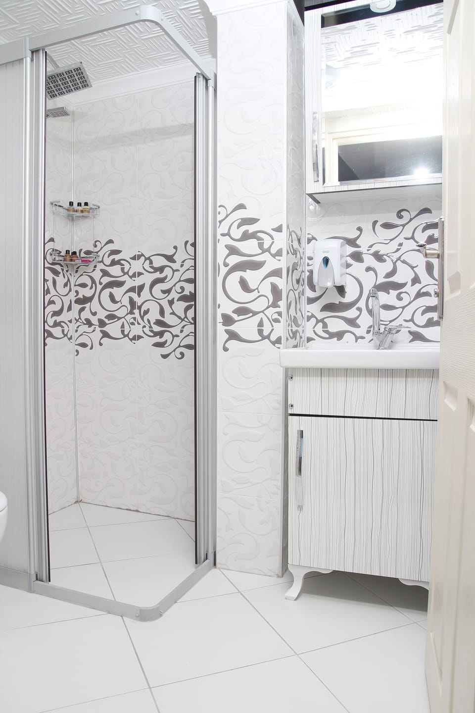 Shower, free toiletries, hair dryer, slippers