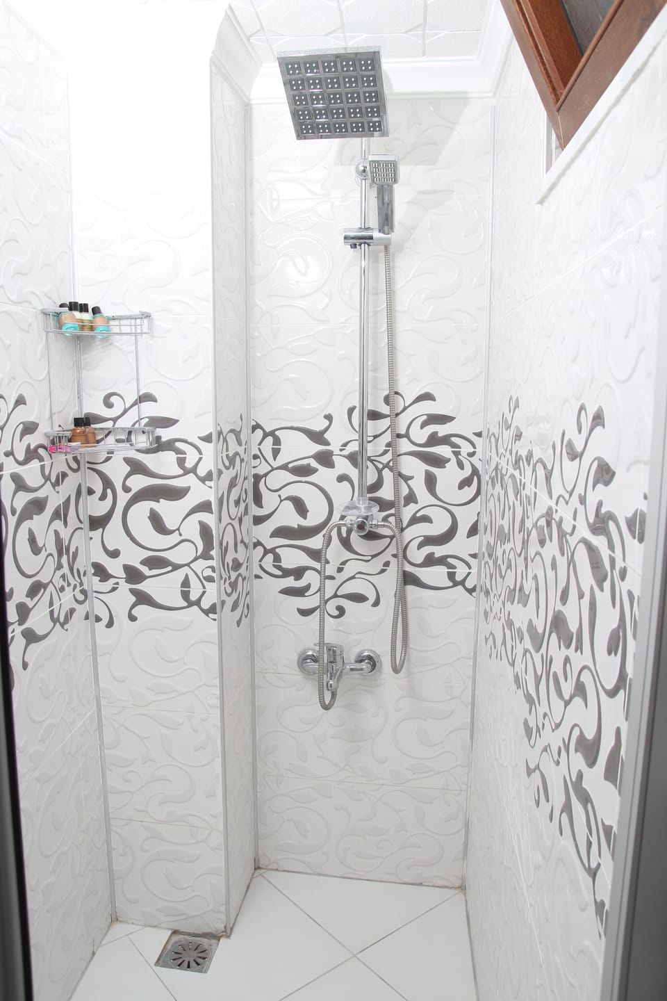 Shower, free toiletries, hair dryer, slippers