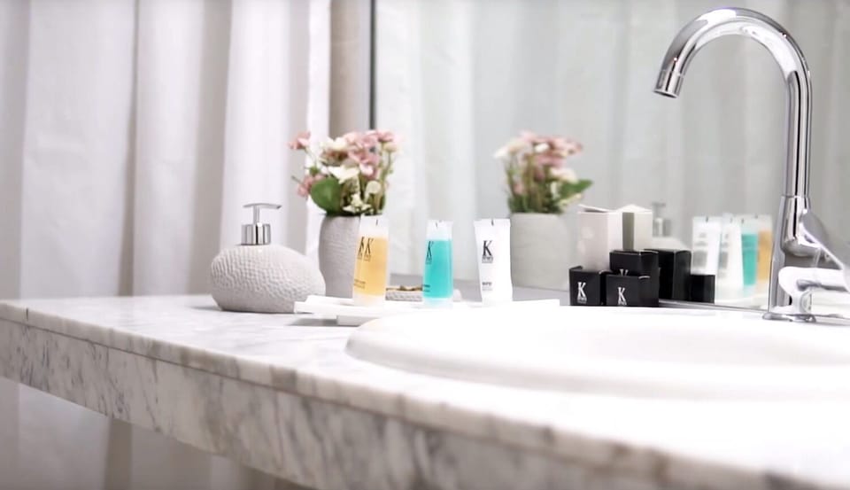 Deep soaking tub, rainfall showerhead, free toiletries, towels