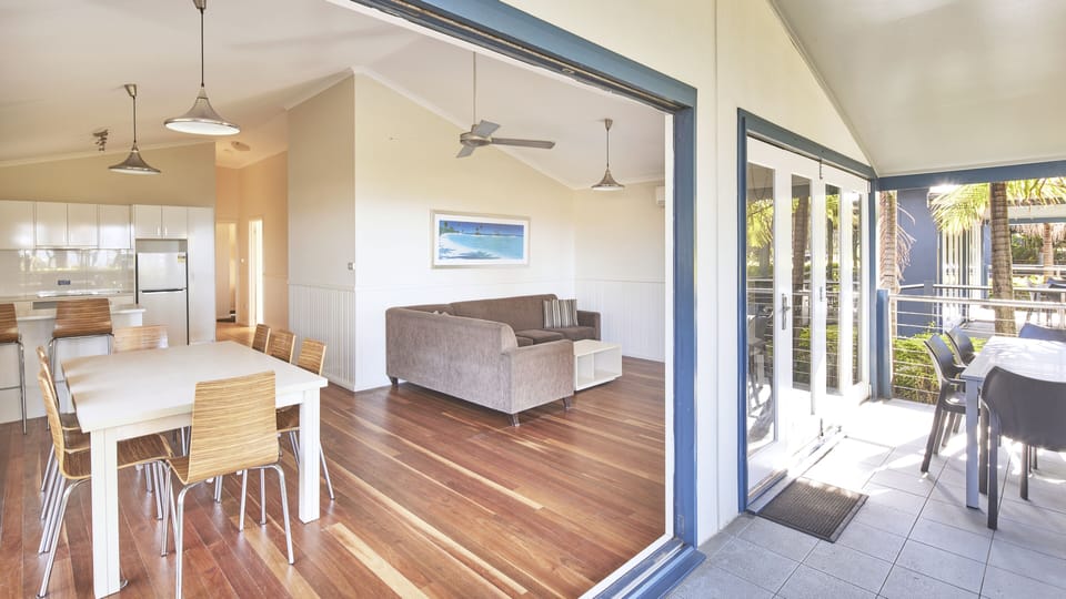 Seabreeze Sands villa | Living area | 26-inch flat-screen TV with satellite channels, TV, DVD player