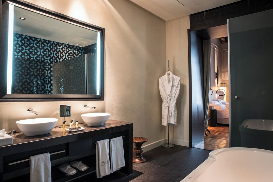 Designer toiletries, hair dryer, bathrobes, slippers