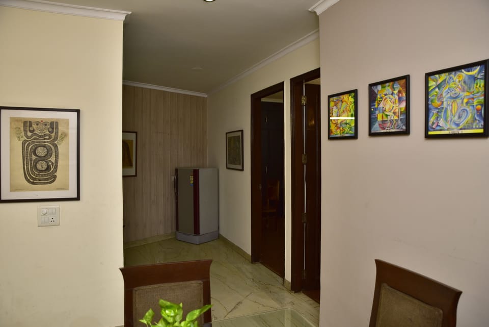 Woodpecker Apartment 2 Bedroom Service Apartment | Living area | Flat-screen TV
