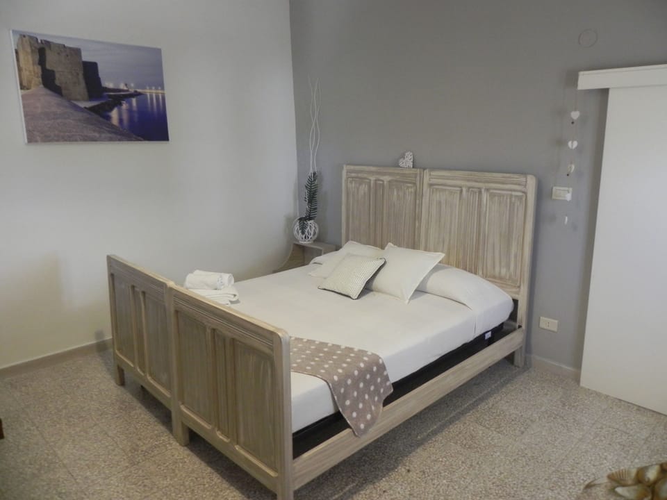 Apartment, 2 Bedrooms, Patio | Desk, blackout drapes, soundproofing, bed sheets