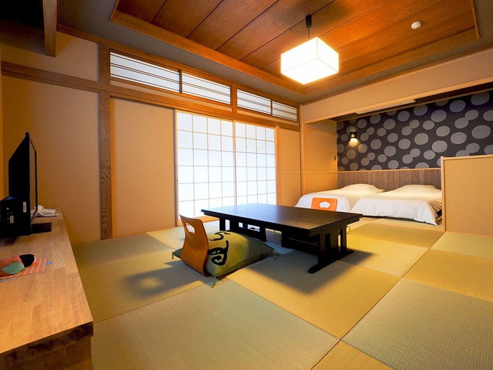 Standard Twin Room | Down comforters, in-room safe, individually decorated