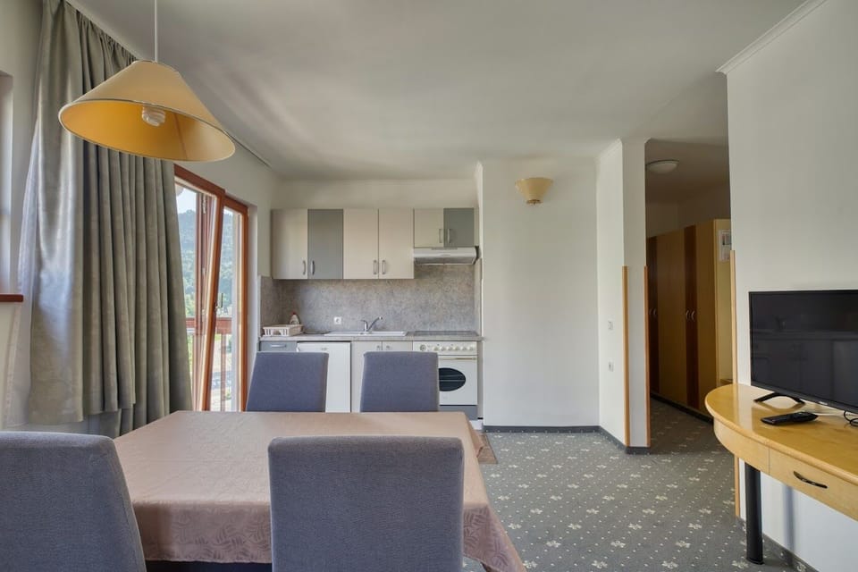 Family Apartment | In-room safe, desk, laptop workspace, blackout drapes