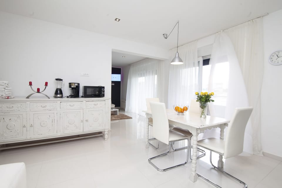 Two-Bedroom Apartment with Sea View and Balcony | Living area | 32-inch TV with digital channels, pay movies, streaming services