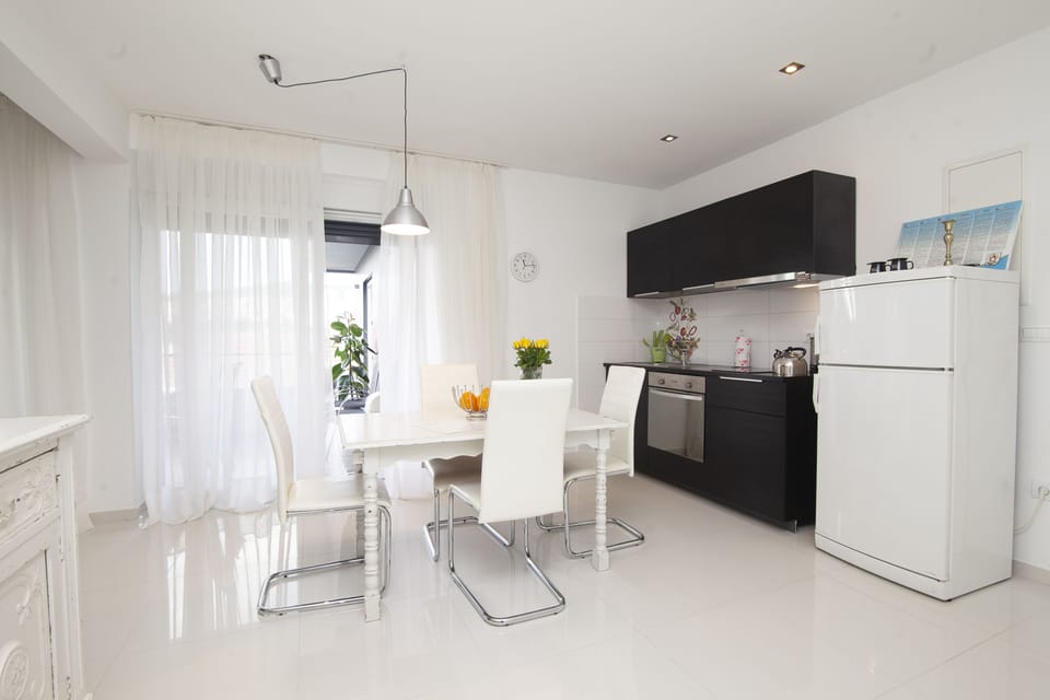 Two-Bedroom Apartment with Sea View and Balcony | Living area | 32-inch TV with digital channels, pay movies, streaming services