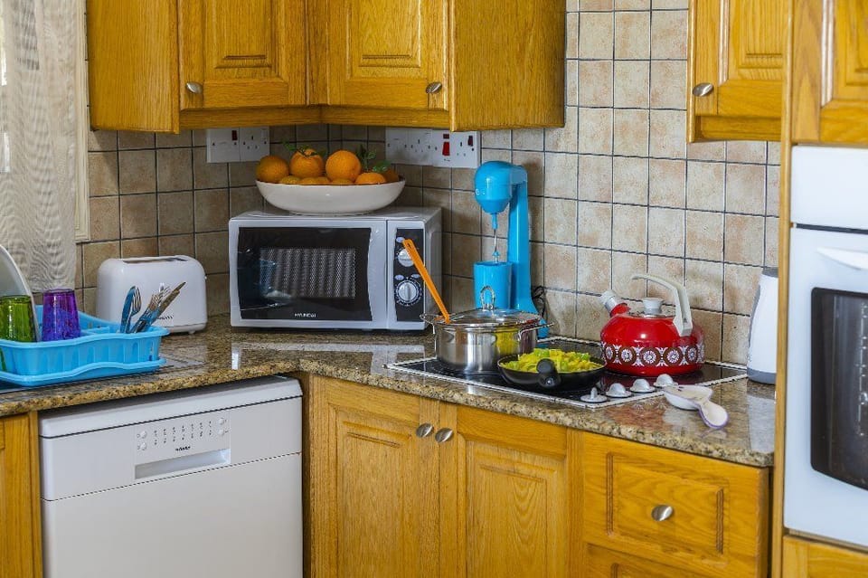 Villa, 3 Bedrooms, Terrace, Sea View | Private kitchen | Coffee/tea maker, full-size fridge, microwave, oven