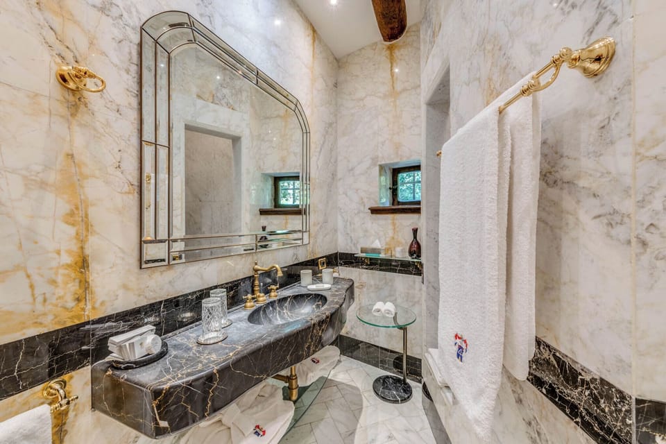 Deluxe Room | Bathroom | Designer toiletries, hair dryer, slippers, bidet