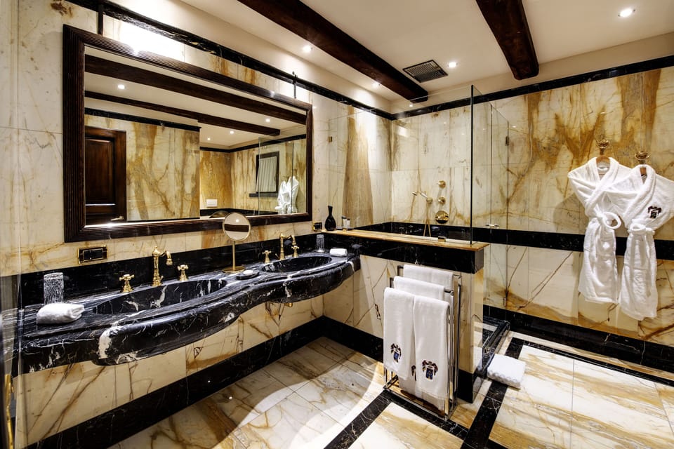 Presidential Suite | Bathroom | Designer toiletries, hair dryer, slippers, bidet