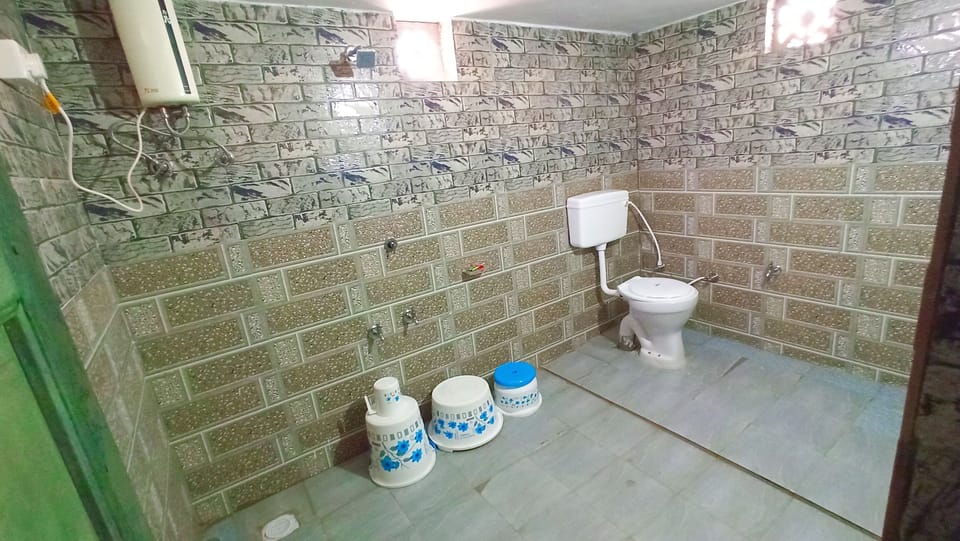 Separate tub and shower, free toiletries, slippers, towels