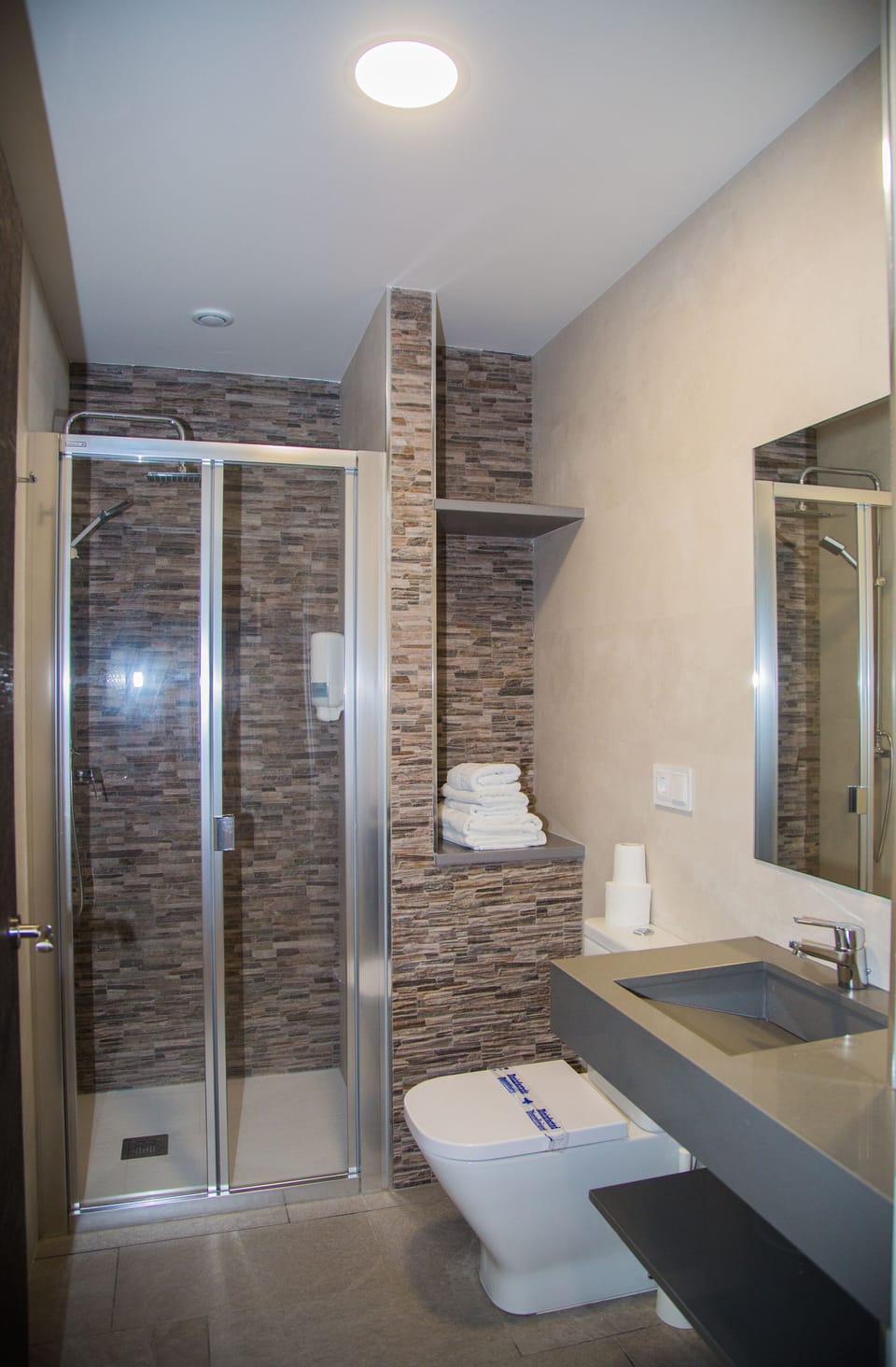 Shower, rainfall showerhead, towels