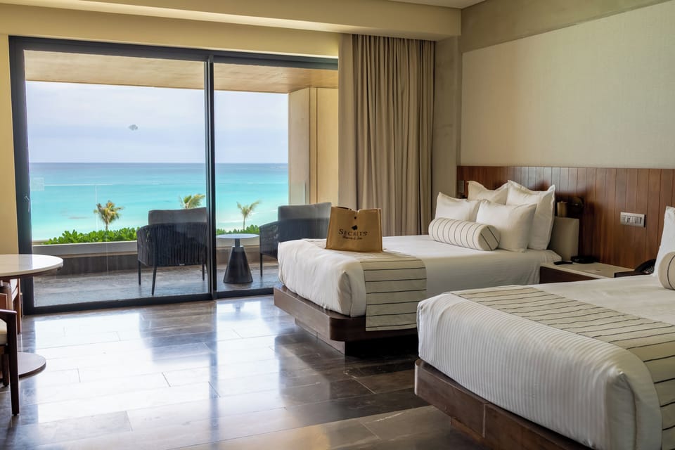 Preferred Club Junior Suite Ocean Front Double | Premium bedding, pillowtop beds, minibar, in-room safe