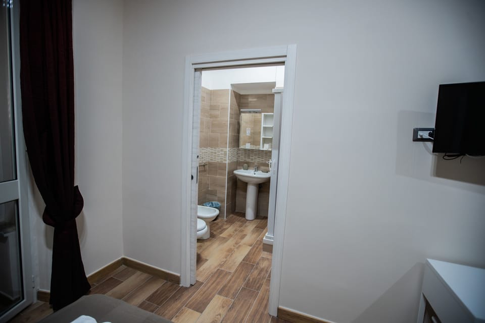 Comfort Room, City View | Bathroom | Shower, rainfall showerhead, eco-friendly toiletries, hair dryer