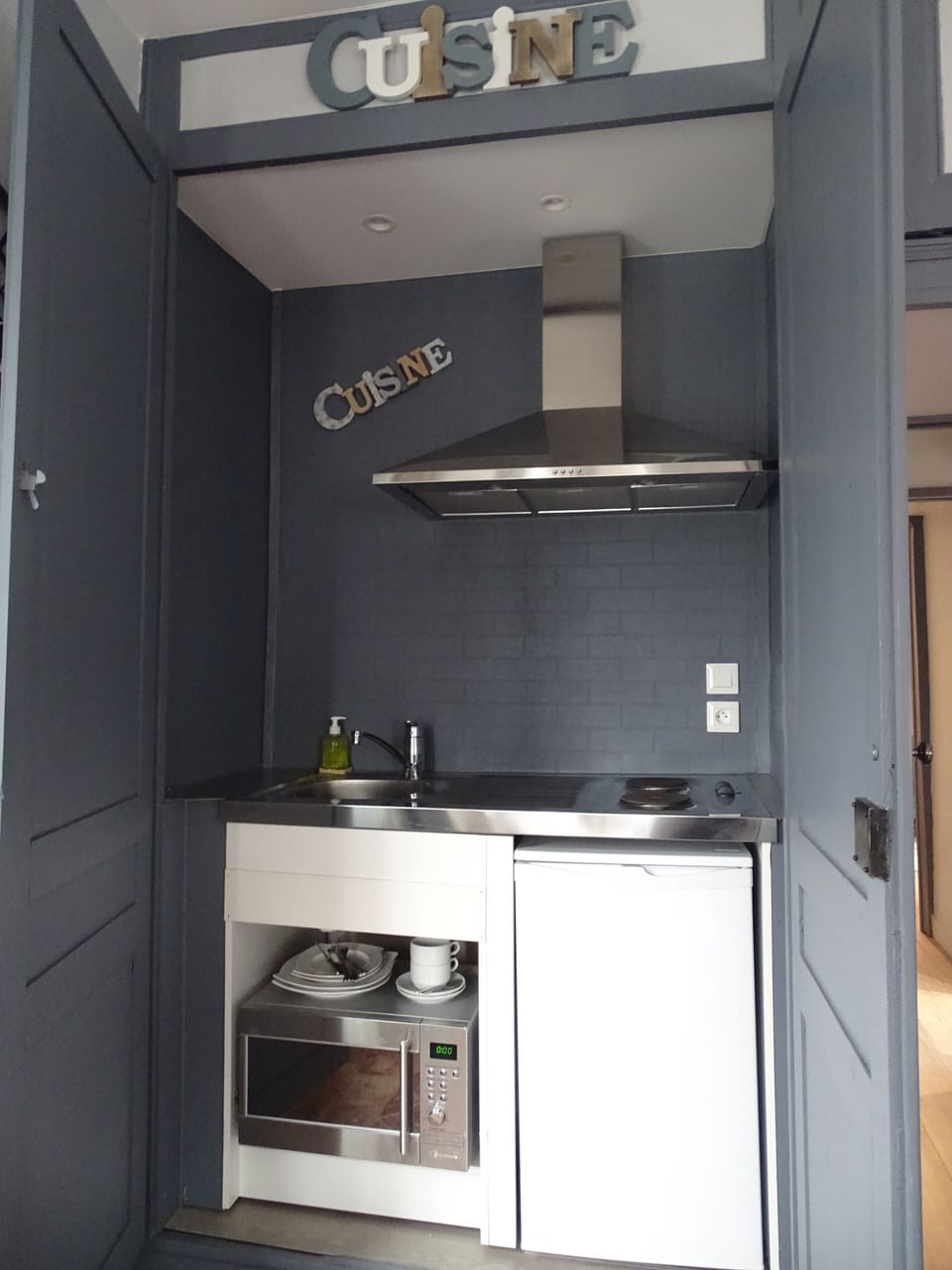 Family Room | Private kitchenette | Highchair