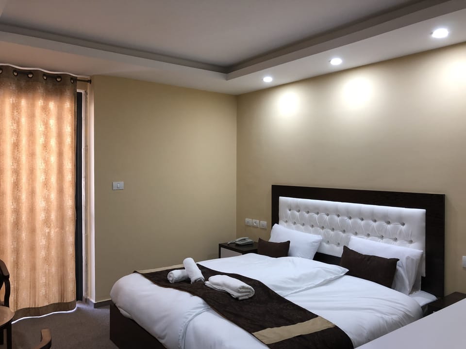 Deluxe Quadruple Room, Multiple Beds, Non Smoking | 3 bedrooms, free minibar, in-room safe, individually decorated