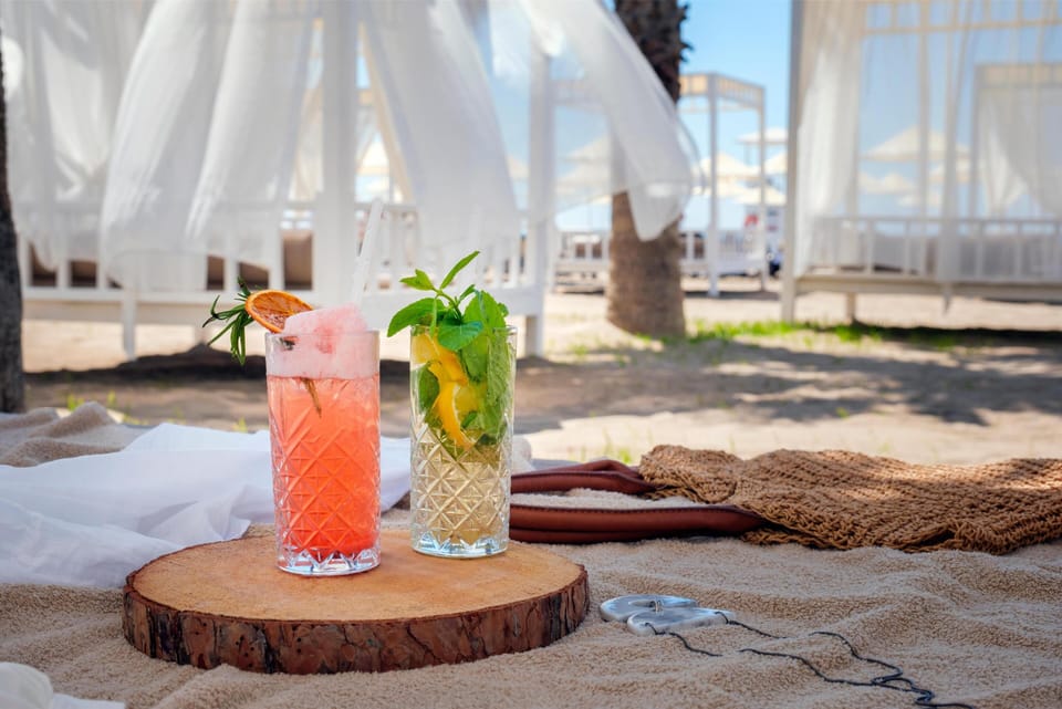 On the beach, sun loungers, beach umbrellas, beach towels