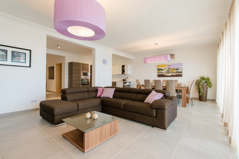 Apartment, 3 Bedrooms | Living room | 50-inch Smart TV with cable channels, TV