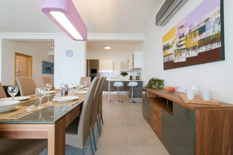 Apartment, 3 Bedrooms | Living area | 50-inch Smart TV with cable channels, TV