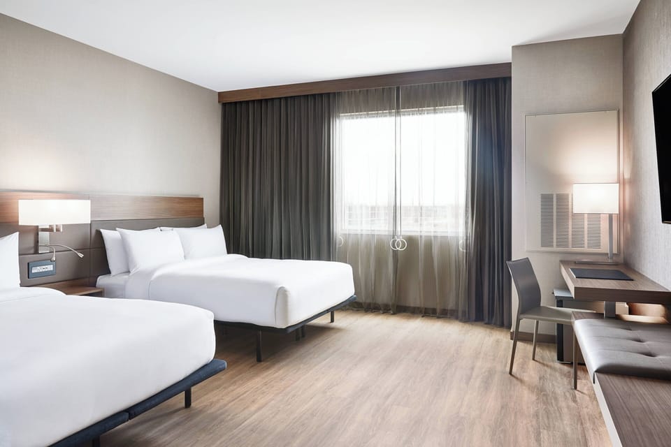 Hypo-allergenic bedding, in-room safe, desk, laptop workspace