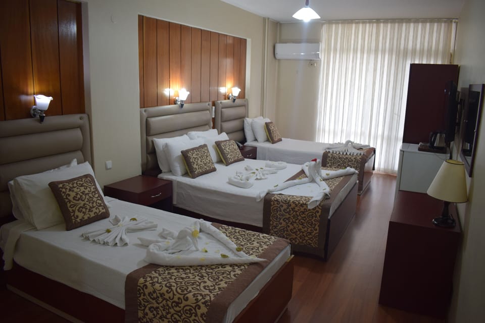Comfort Room | In-room safe, blackout drapes, free WiFi, bed sheets