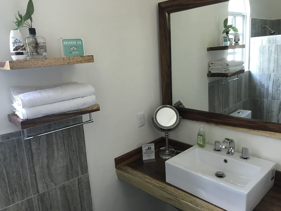 Family Room, Non Smoking, Pool View | Bathroom sink