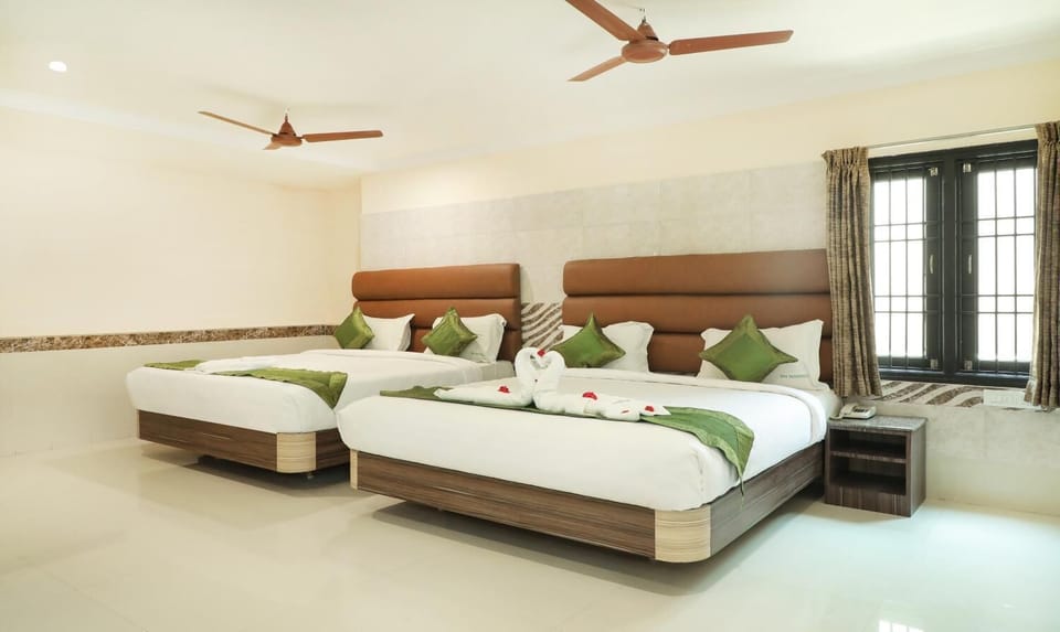 Blackout drapes, iron/ironing board, rollaway beds, free WiFi