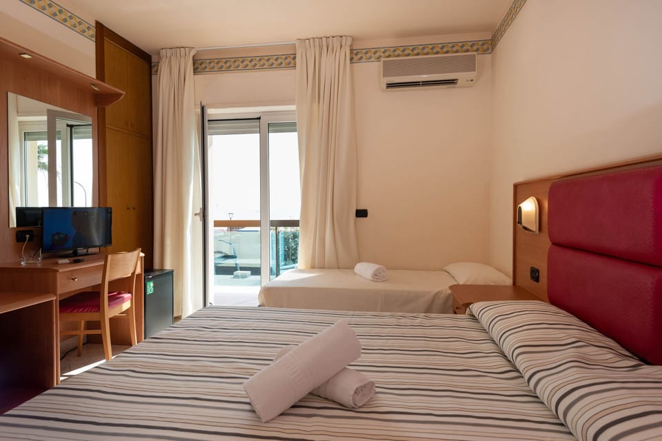 Classic Triple Room, Multiple Beds, Non Smoking | In-room safe, desk, blackout drapes, WiFi (free)