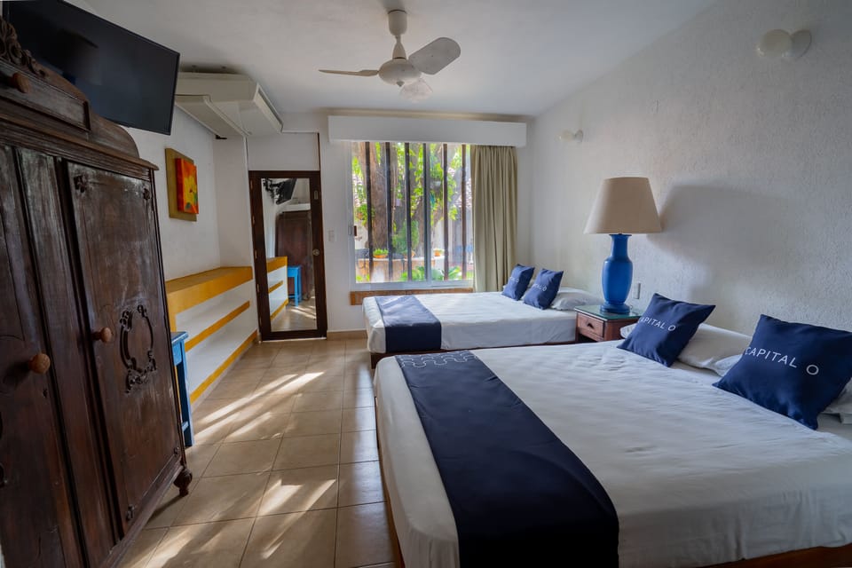 Deluxe Double Room | Iron/ironing board, bed sheets