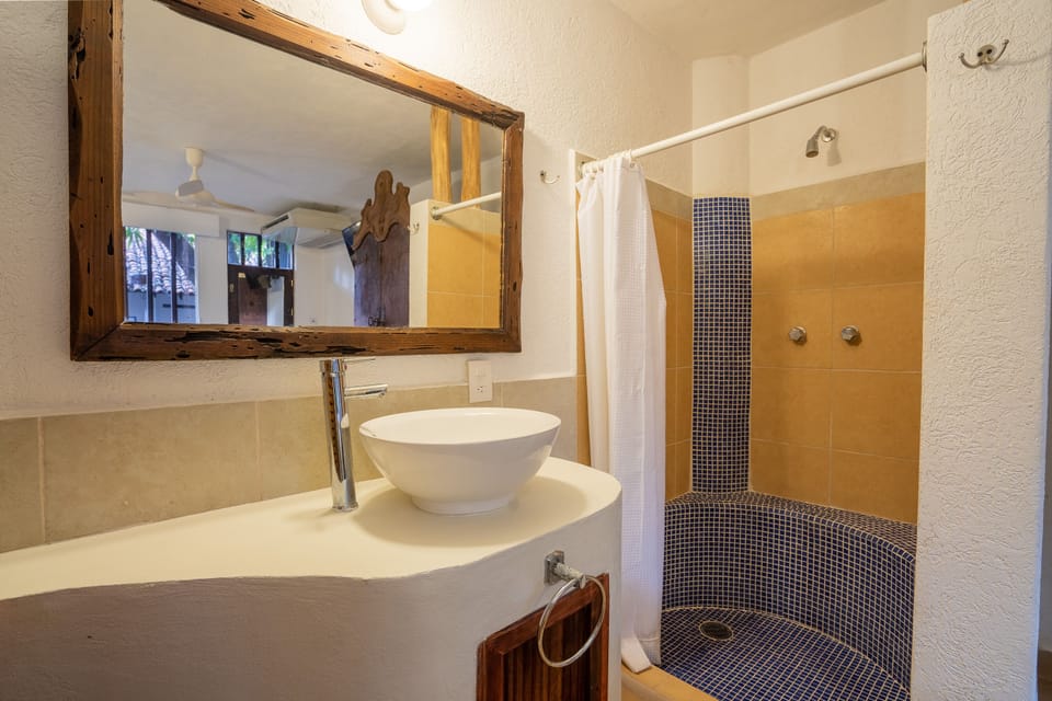 Shower, free toiletries, towels, soap