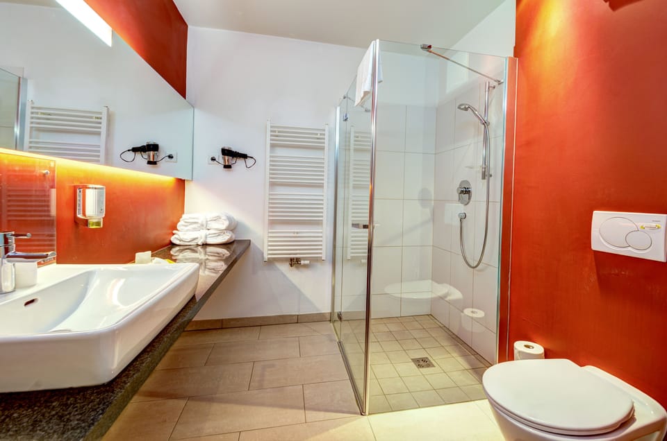 Shower, free toiletries, hair dryer, bathrobes
