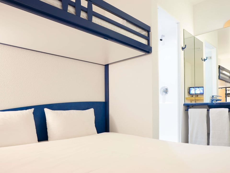 Hypo-allergenic bedding, blackout drapes, soundproofing, free WiFi