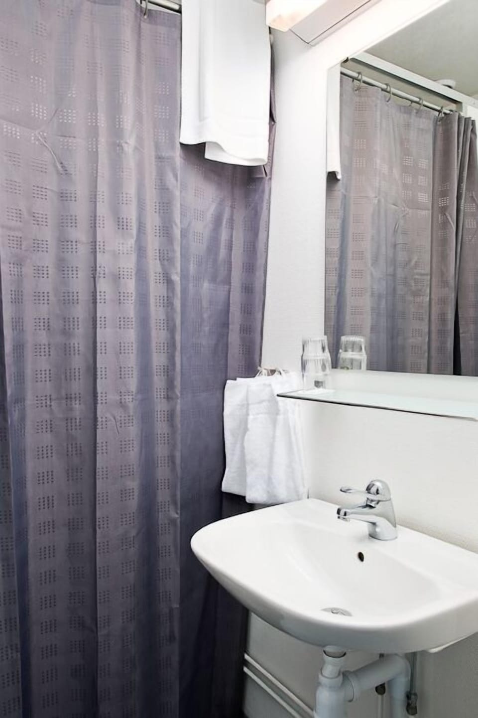 Shower, hair dryer (on request), towels, soap