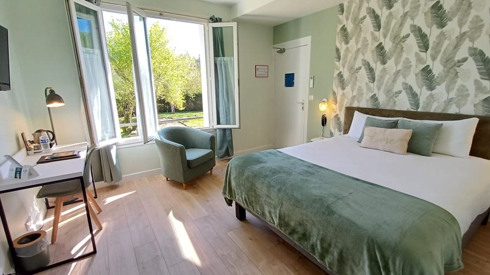 Double Room | Desk, blackout drapes, iron/ironing board, free WiFi