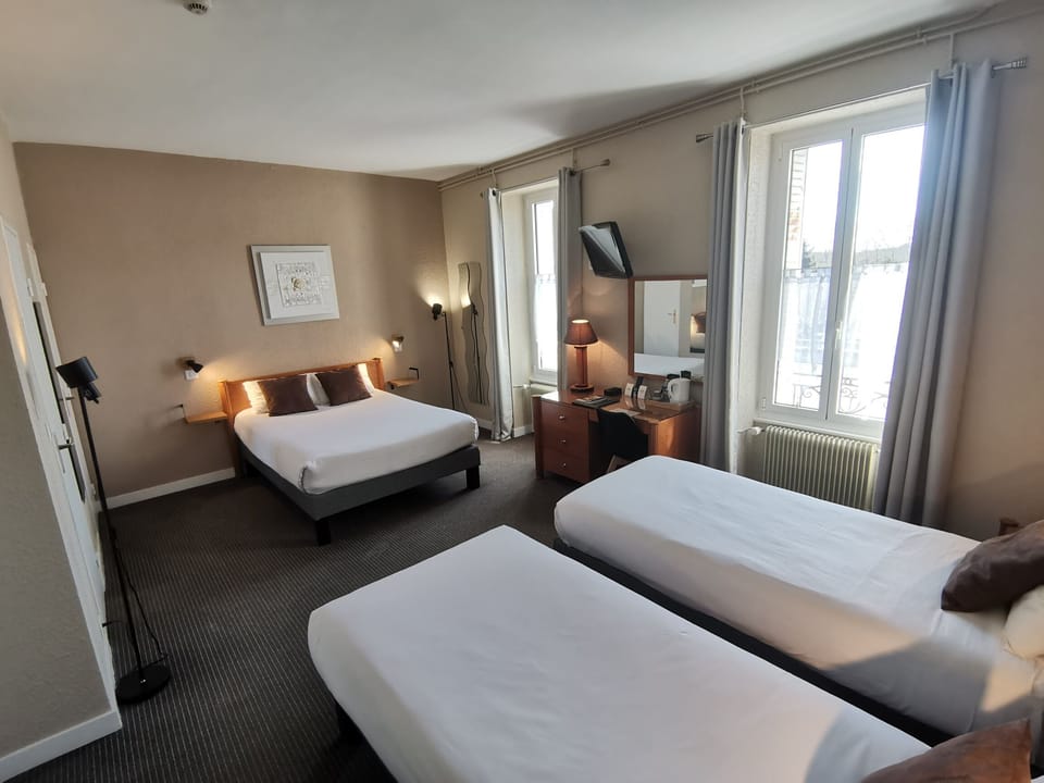 Quadruple Room | Desk, blackout drapes, iron/ironing board, free WiFi