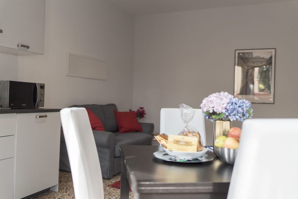 Apartment, 1 Bedroom | Living room | Flat-screen TV