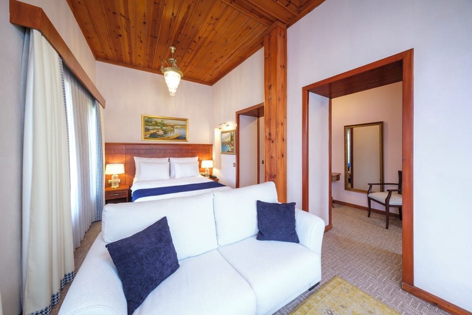 Deluxe Double Room | Premium bedding, in-room safe, laptop workspace, blackout drapes
