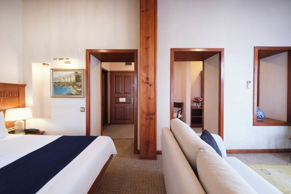 Deluxe Double Room | Premium bedding, in-room safe, laptop workspace, blackout drapes
