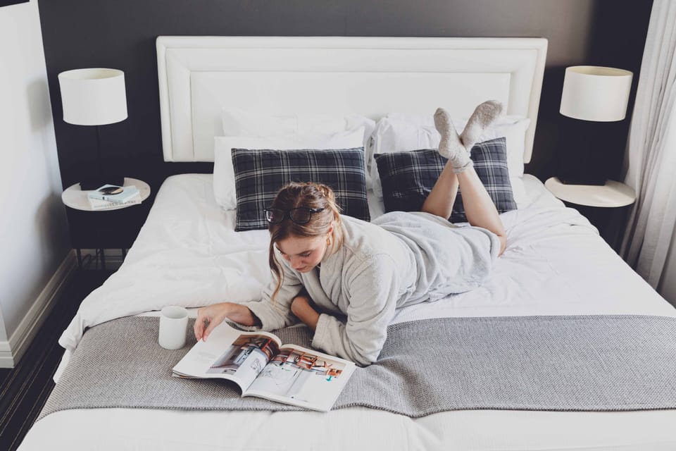 Lower Ground Room | Premium bedding, desk, laptop workspace, blackout drapes