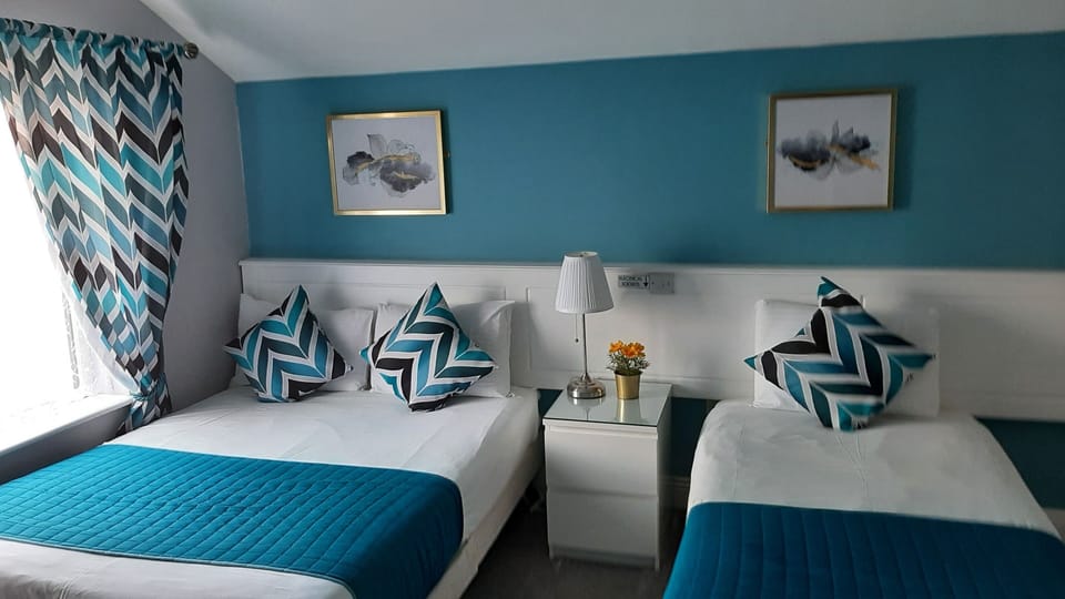 Double or Twin Room | Blackout drapes, iron/ironing board, free WiFi