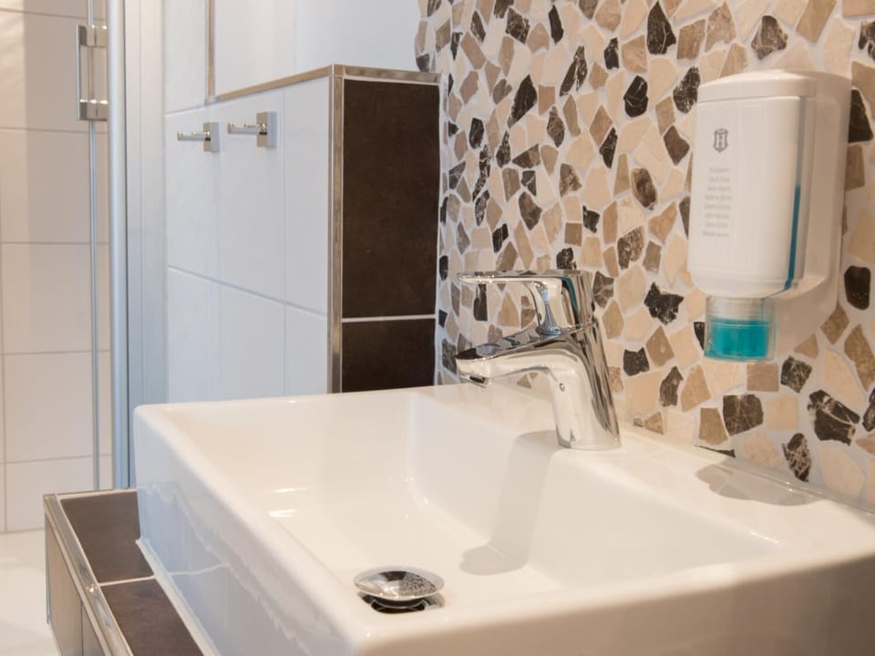 Shower, free toiletries, hair dryer, towels