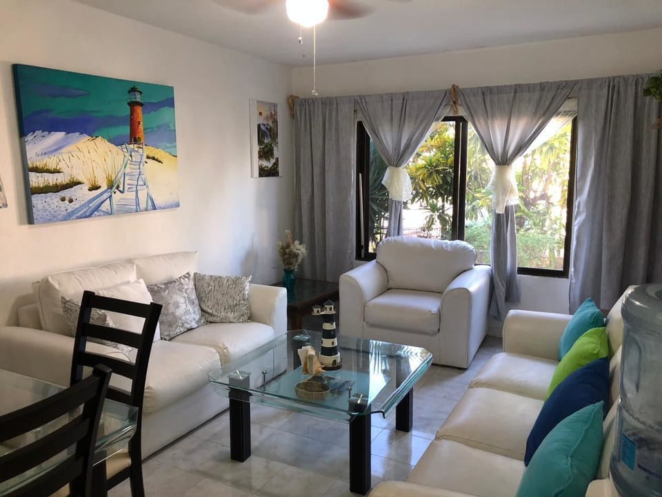 Deluxe House | Living room | Flat-screen TV