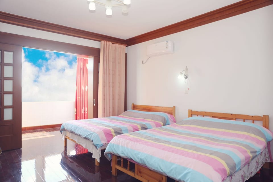 Quadruple Room (Shared Bathroom ) | Blackout drapes, free WiFi, bed sheets